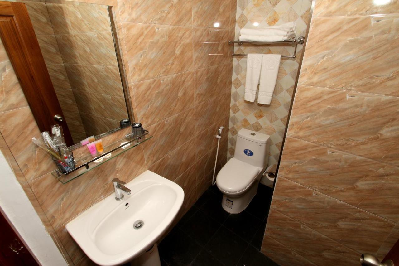 Gemsy Hotel Yangon Quarto foto
